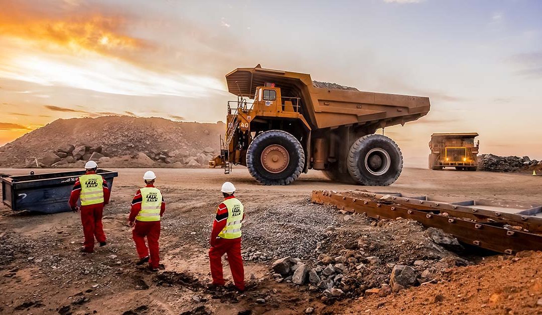 Heavy mining haul truck at an open-cast mine representing business rescue and post-commencement finance in South Africa.
