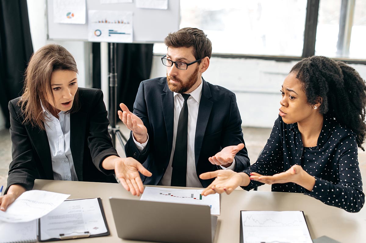 Business executives discussing a corporate governance dispute during a boardroom meeting.